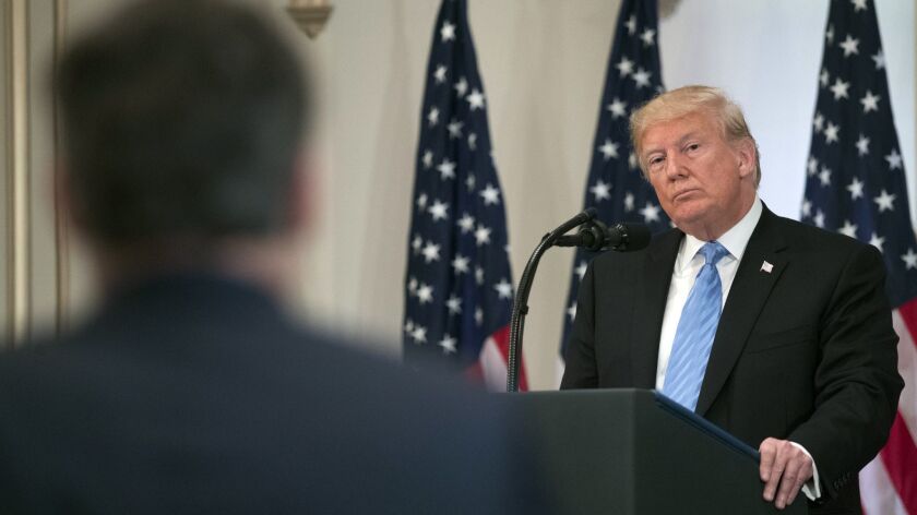 President Trump takes a question from CNN's Jim Acosta during a news conference in New York on Sept. 26.