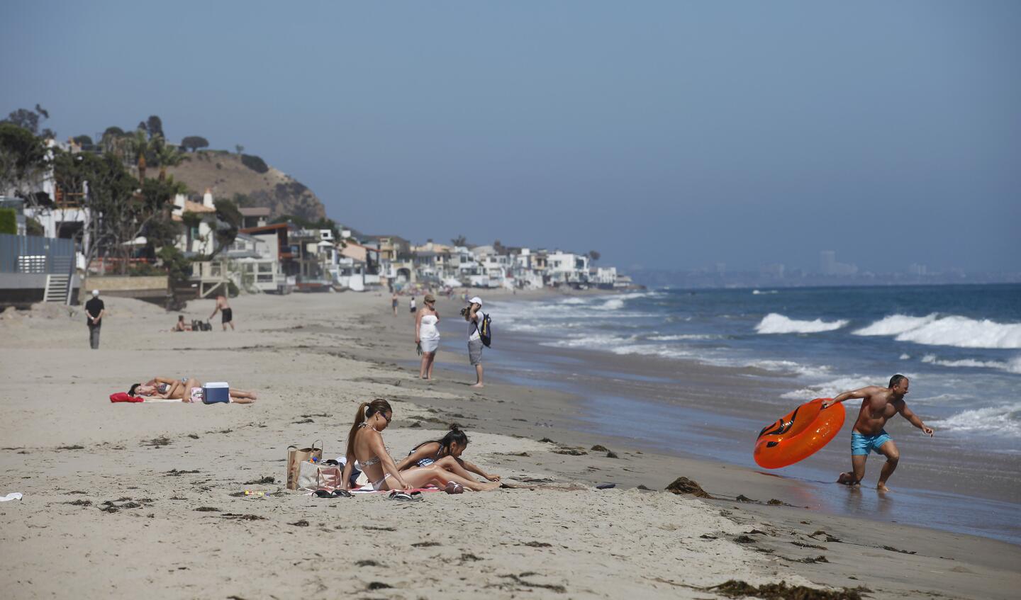 Sun tanning at Carbon Beach