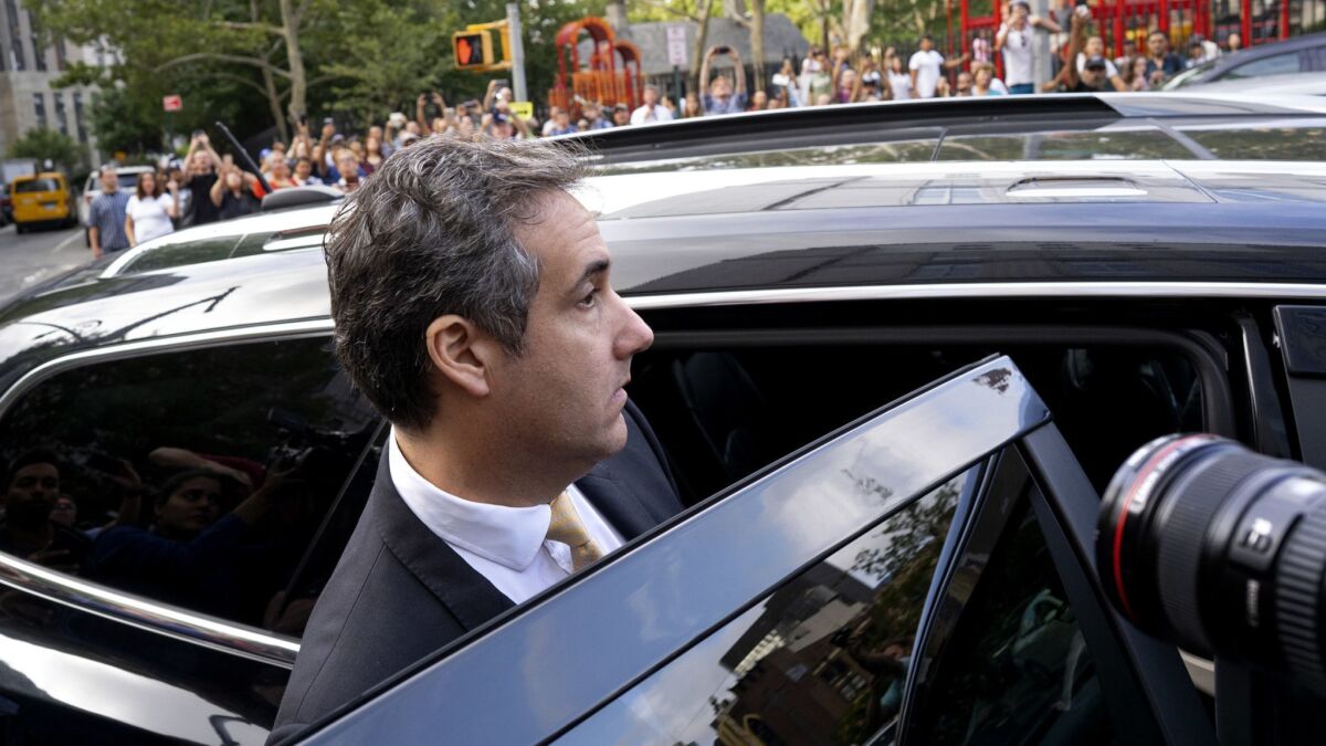 Michael Cohen leaves federal court in New York on Aug. 21 after pleading guilty to eight felonies, including one for paying off porn star Stormy Daniels “at the request and suggestion” of an unnamed person in the Trump campaign.