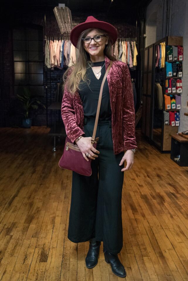 Who: Shelby Blondell, 25, Linthicum resident, songwriter/singer/inventor Spotted at: #LinkedInLocal Baltimore 2019 Kick Off Event at Christopher Schafer Clothier What she wore: Ro & De claret crushed velvet blazer, Michael Kors black sleeveless top with cut-out neckline, and Michael Kors burgundy crossbody bag – all from T.J.Maxx; black booties and Who What Wear black cropped pants from Target; and burgundy felt hat from a shop in Ellicott City. It’s become known as her signature hat: “Every show I do, I’m known as the girl in the red hat. When I don’t wear it, people ask me where it is. I even wore it to the Grammys last year.”