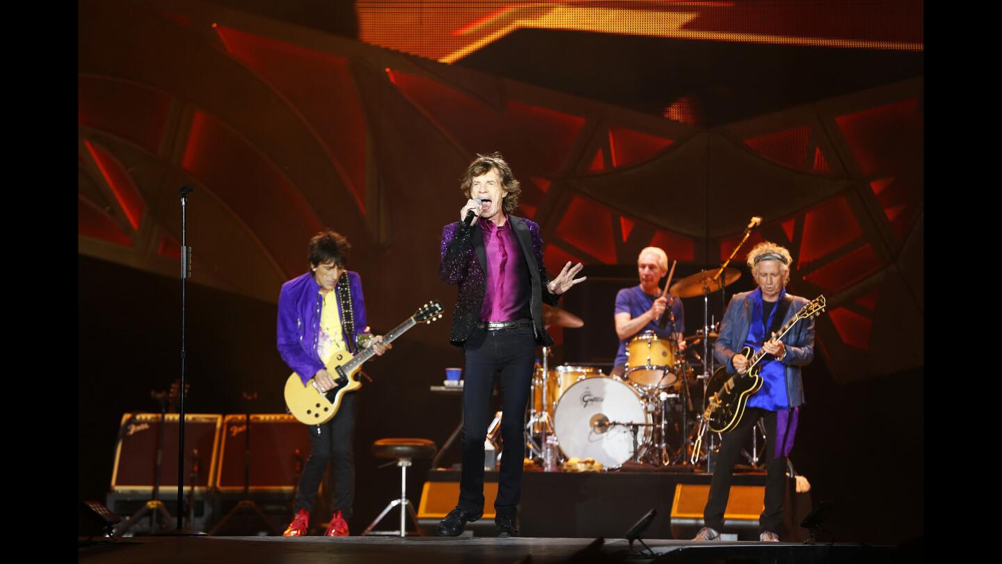 Guitarist Ron Wood, left, singer Mick Jagger, drummer Charlie Watts and guitarist Keith Richards of the Rolling Stones perform in San Diego.