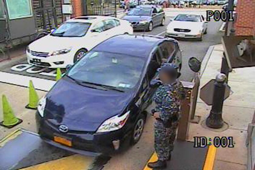This image from video released by the FBI shows a Toyota Prius driven by Aaron Alexis as he arrives at the Washington Navy Yard gate.