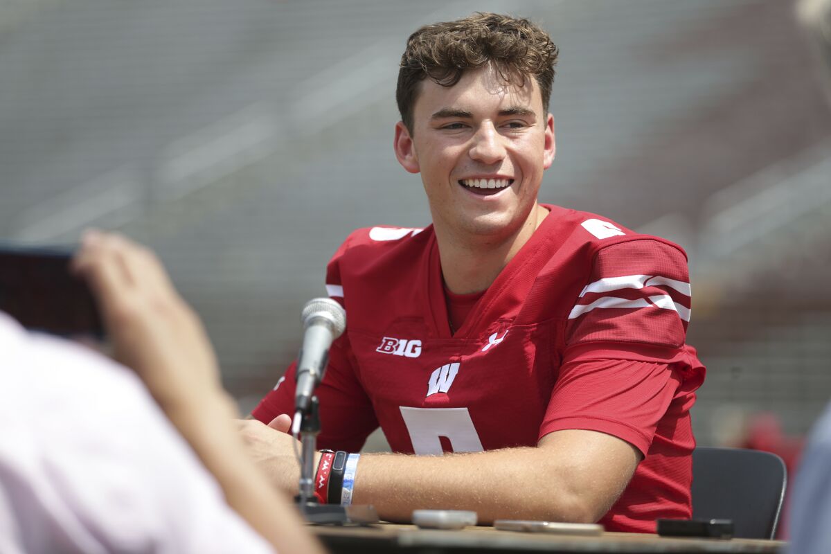 Wisconsin quarterback Graham Mertz is interviewed during the team's NCAA college football media day at Camp Randall Stadium in Madison, Wis., Thursday, Aug. 5, 2021. (Kayla Wolf/Wisconsin State Journal via AP)