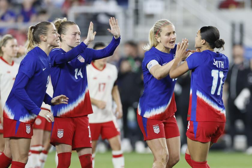 United States' Sophia Smith, right, celebrates her goal against Canada with teammates during the shoot out of a SheBelieves Cup women's soccer match Tuesday, April 9, 2024, in Columbus, Ohio. (AP Photo/Jay LaPrete)