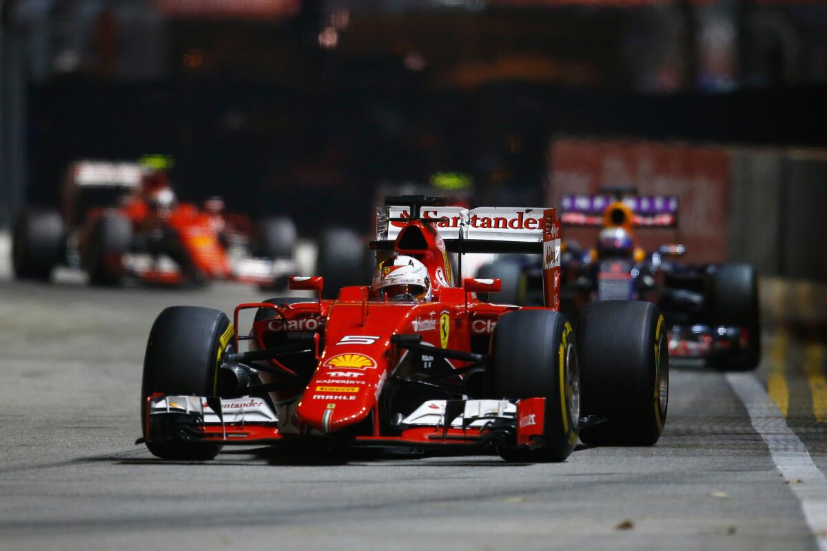 Formula One driver Sebastian Vettel leads the pack during the Formula One Grand Prix of Singapore on Sunday.