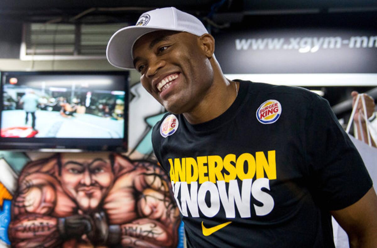 Anderson Silva arrives for a news conference for UFC 162.