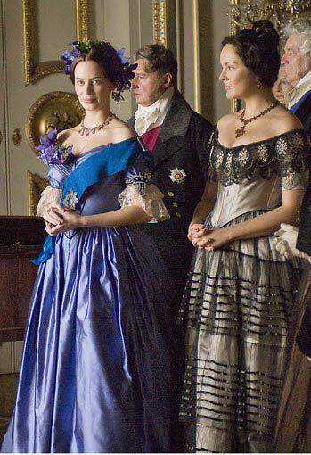 In "The Young Victoria" (in limited release Dec. 18), about the first years of Victoria's reign and her romance with Prince Albert, the costumes are not only exquisitely detailed (think Victorian-era silks, flower headdresses and exact reproductions of coronation robes and crown jewels), they also highlight a generational divide between the young royal (Emily Blunt) and her mother, the Duchess of Kent ( Miranda Richardson). The duchess is in league with a British nobleman, scheming to wrest power from the 18-year-old princess and heir to the throne. The duchess wears old-fashioned, off-the-shoulder dresses with exaggerated sleeves that suggest an old regime defined by political unrest, and the clothes stand in stark contrast to the princess' youthful style.