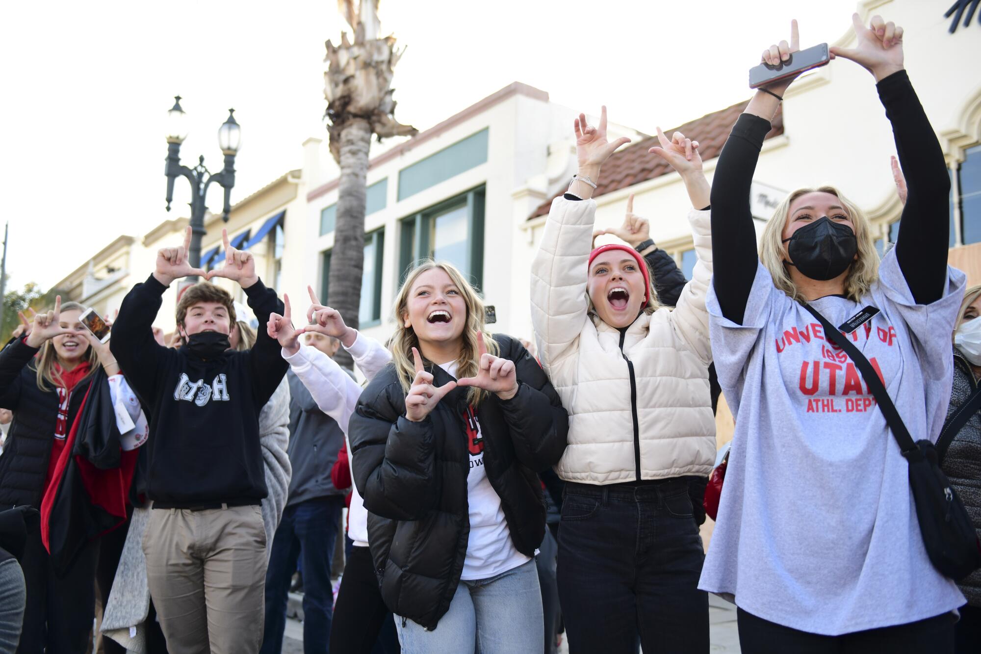 University of Utah fans cheer for the team's float.