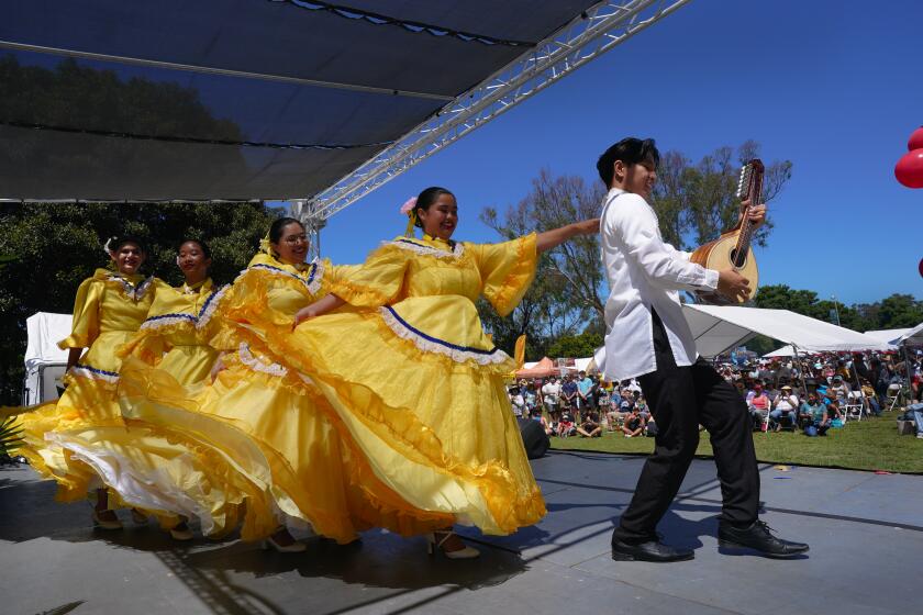 San Diego, CA - August 26: Dancers from the SAMAHAN Company perform on stage at Balboa Park on Saturday, Aug. 26, 2023, for the 36th Philippine Cultural Arts Festival. The SAMAHAN Filipino American Performance Arts & Education Center held its 36th Philippine Cultural Arts Festival. The festival gives San Diego locals as well as tourists the opportunity to learn about Philippine culture and performing arts through dance and music. Nelvin C. Cepeda / The San Diego Union-Tribune)