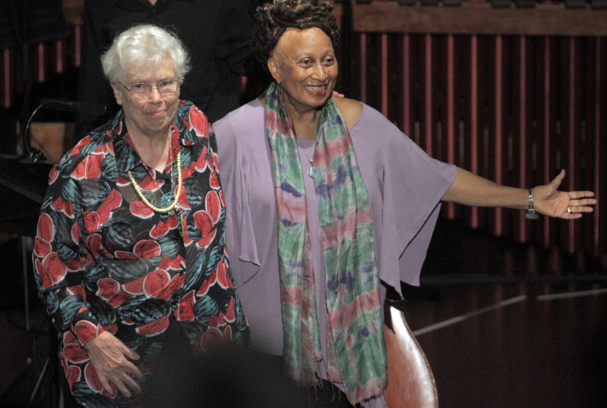 The late composer Pauline Oliveros, left, with librettist Ione, at an L.A. opera festival in 2013.
