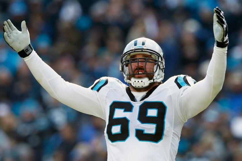 The Carolina Panthers' Jared Allen gestures during an NFC playoff game against Seattle on Jan. 17.