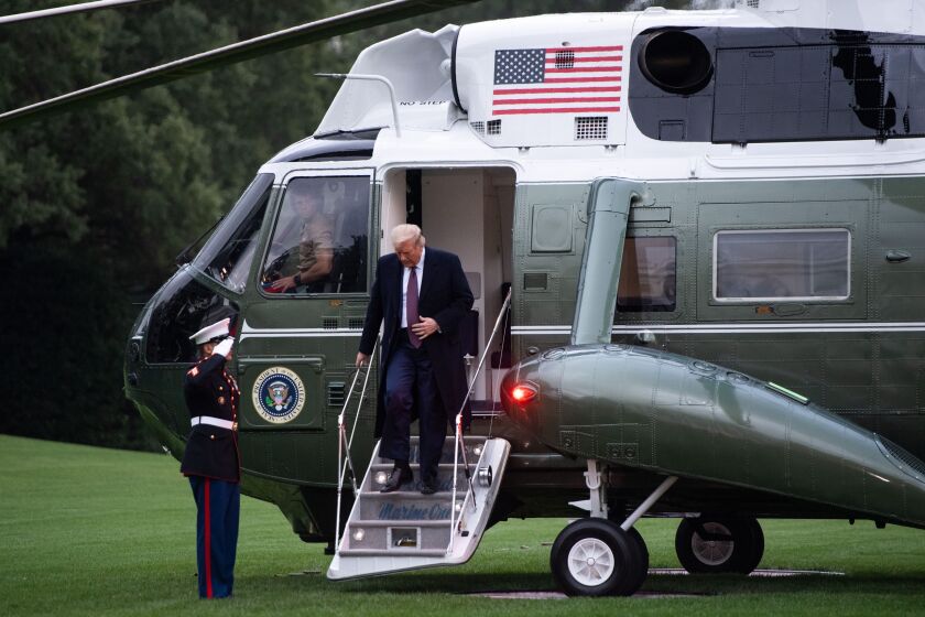 US President Donald Trump steps off Marine One after arriving on the South Lawn of the White House in Washington, DC, October 1, 2020, following campaign events in New Jersey. (Photo by SAUL LOEB / AFP) (Photo by SAUL LOEB/AFP via Getty Images)
