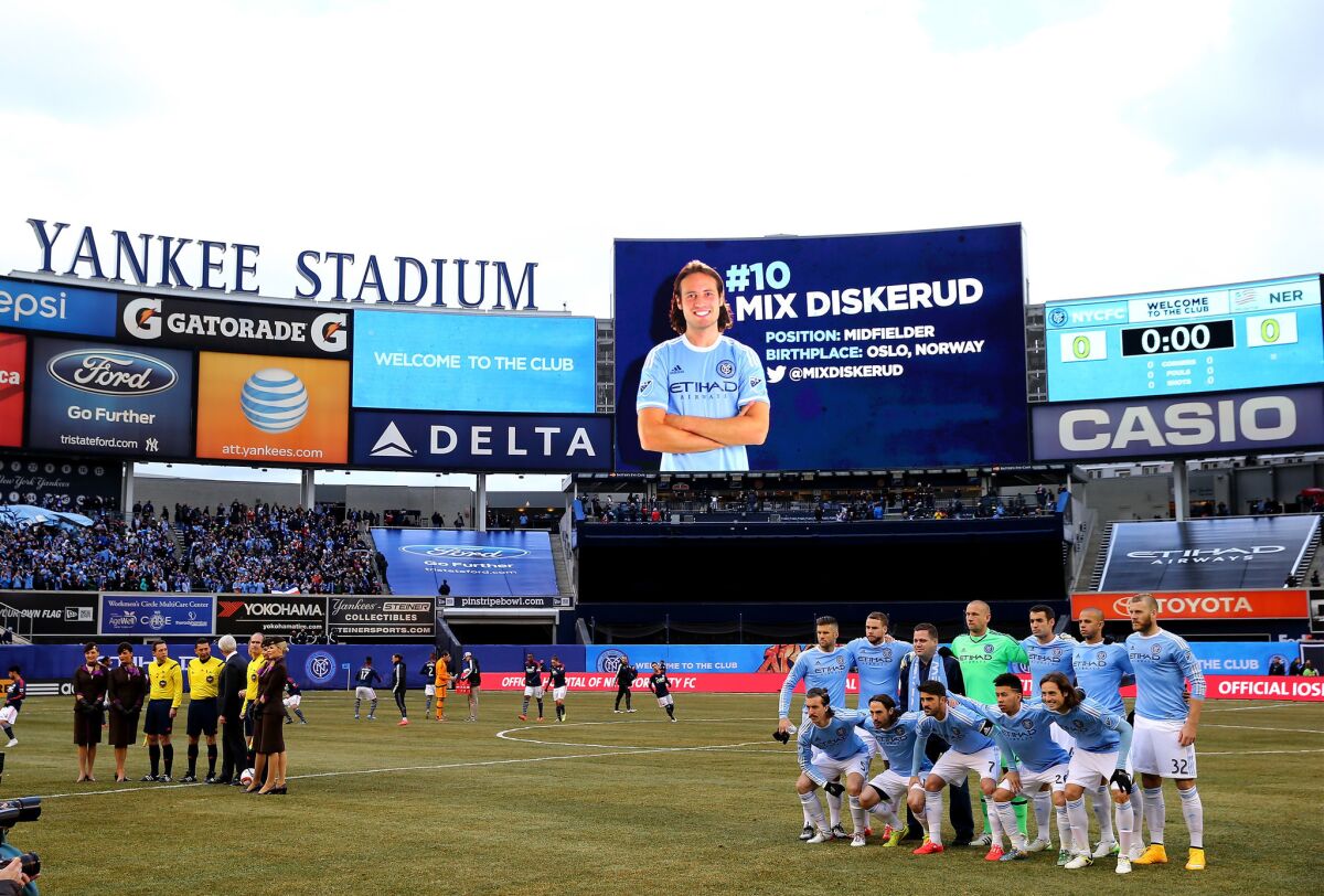 The starters for New York City FC pose for a photo before their inaugural game against the New England Revolution at Yankee Stadium on March 15, 2015.