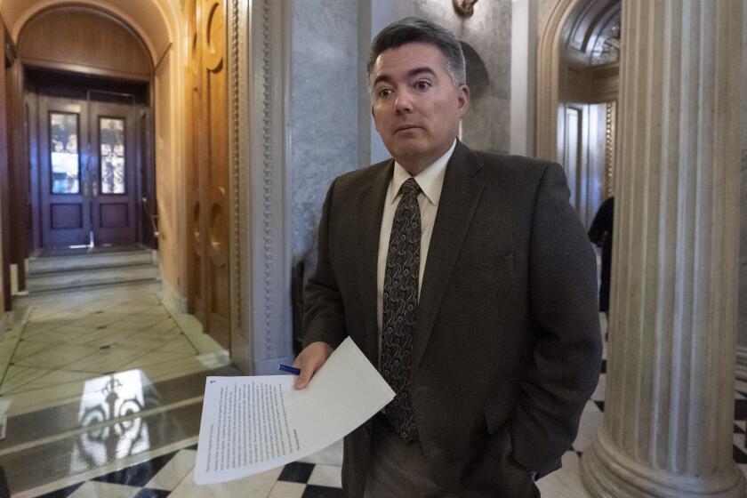 Sen. Cory Gardner, R-Colo., arrives at the Senate Chamber for an abbreviated pro-forma session at the Capitol in Washington, Monday, Dec. 31, 2018, as a partial government shutdown stretches into its second week. A high-stakes move to reopen the government will be the first big battle between Nancy Pelosi and President Donald Trump as Democrats come into control of the House. The new Democratic House majority gavels into session this week with legislation to end the government shutdown. Pelosi and Trump both think they have public sentiment on their side in the battle over Trump's promised U.S.-Mexico border wall. (AP Photo/J. Scott Applewhite)