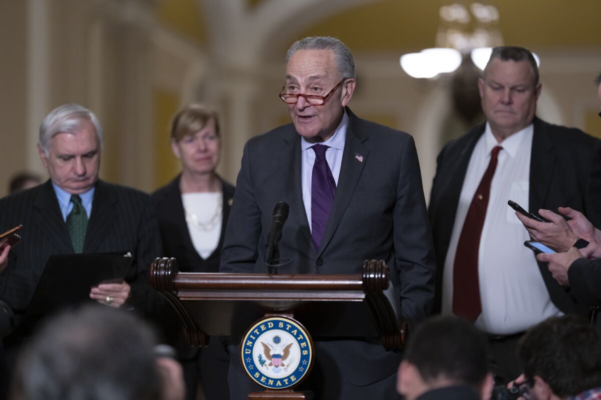 FILE - Senate Majority Leader Chuck Schumer, D-N.Y., speaks to reporters at the Capitol in Washington, Nov. 15, 2022. 