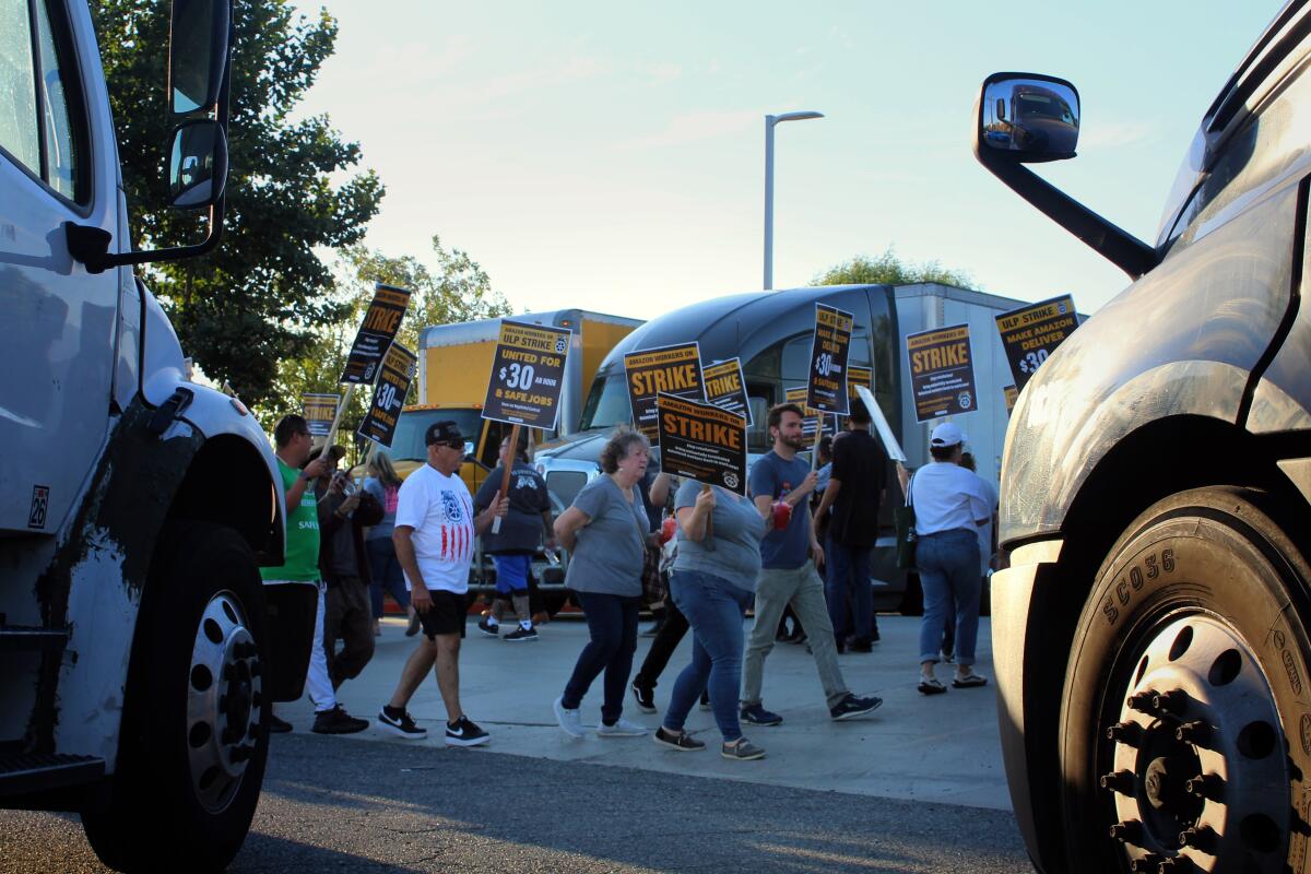 Amazon contract drivers and allies picket outside of Amazon's San Bernardino warehouse on July 13.