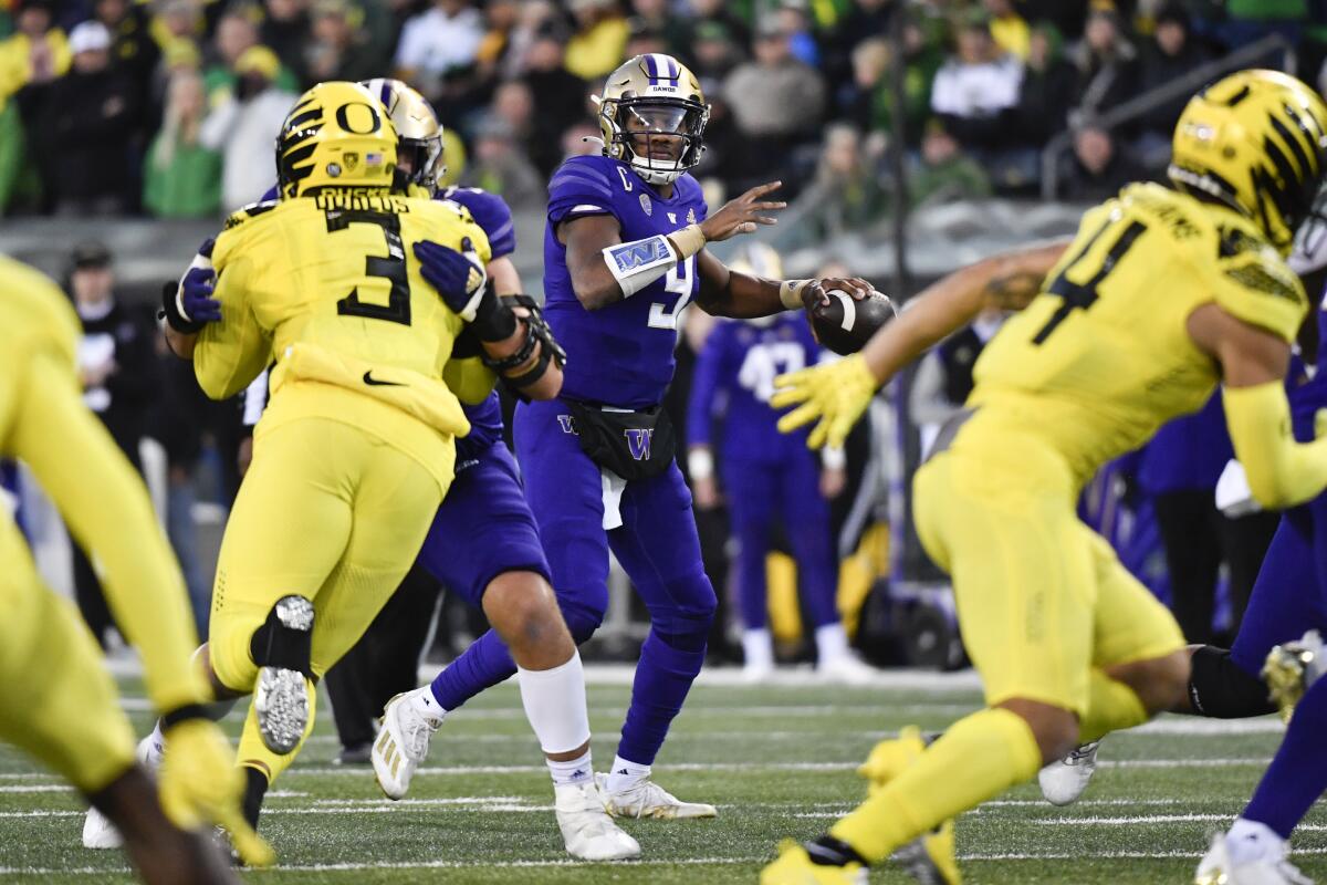 Washington quarterback Michael Penix Jr. looks to pass against Oregon on Nov. 12, 2022.