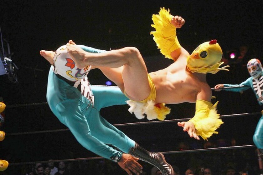 Lucha VaVoom has Mexican wrestlers, burlesque and comedy. And it flies at you fast.