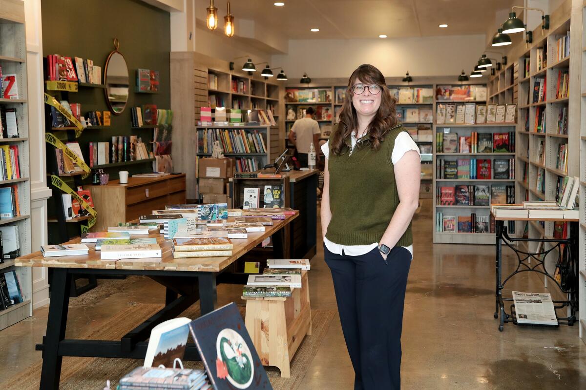 Owner Michelle Pierce stands inside Lido Village Books in Newport Beach.