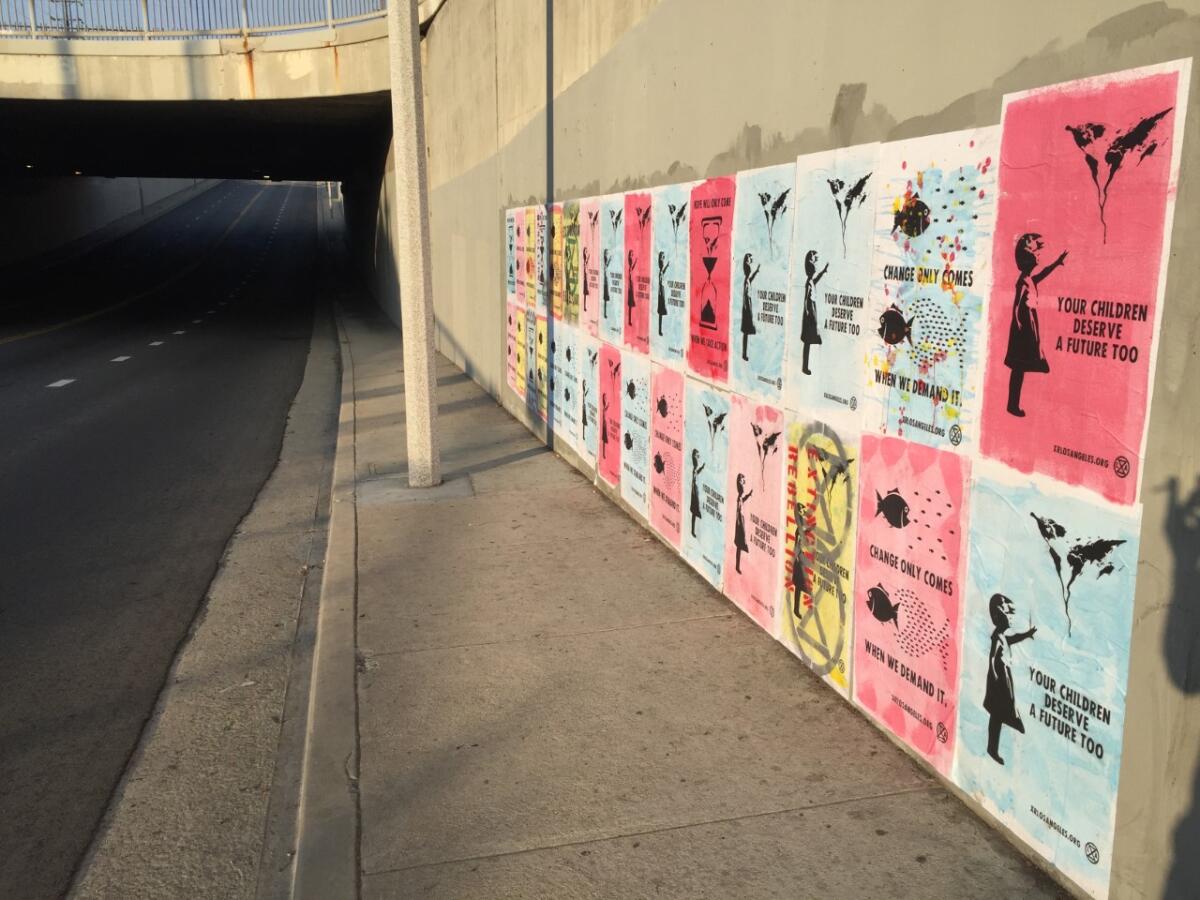 Posters put up by Extinction Rebellion youth members in Los Angeles.