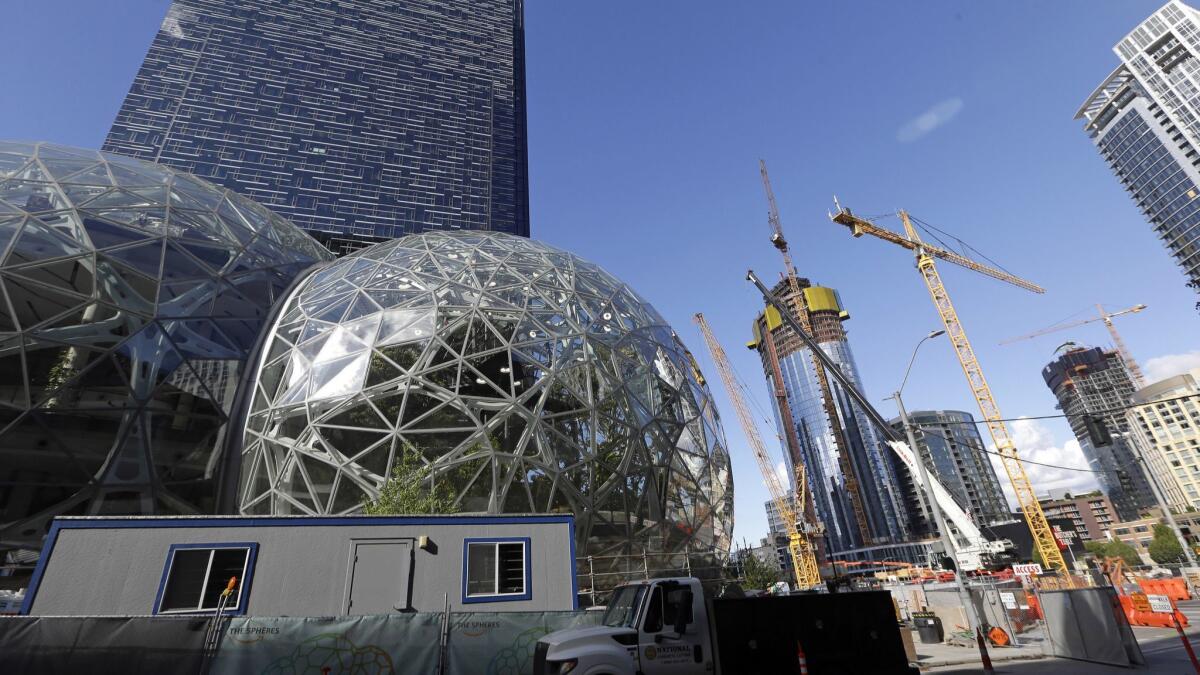 Transparent spheres that are part of Amazon's Seattle complex. More than 70% of Amazon’s job postings require a technical background, but many openings at other tech companies don't.