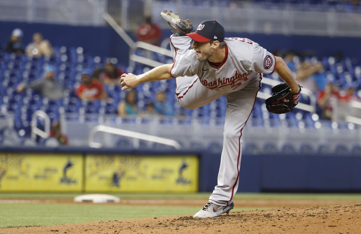 Max Scherzer pitches for the Nationals against the Marlins on June 27, 2021.