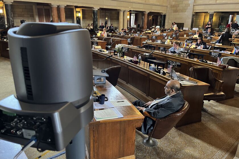 One of several cameras set up to capture live debate in the chamber of the Nebraska Legislature is shown, Wednesday, June 7, 2023, in Lincoln, Neb. State lawmakers say their emails and phone contacts this session revealed a growing number of people who watched the Nebraska Legislature's debates this year either on public television or on their computers, phones and tablets. Some even streamed the debate in their cars. (AP Photo/Margery Beck)