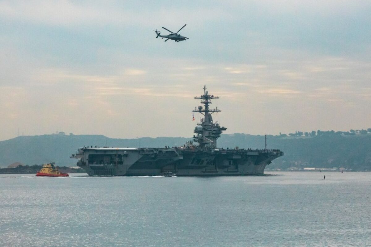 The USS Theodore Roosevelt left San Diego Harbor for deployment on Monday.