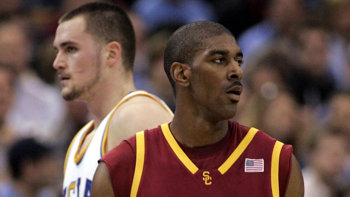 UCLA's Kevin Love, left, and USC's O.J. Mayo during a game in January 2008. Both were so-called one-and-done players who left college basketball after one season to enter the NBA draft.