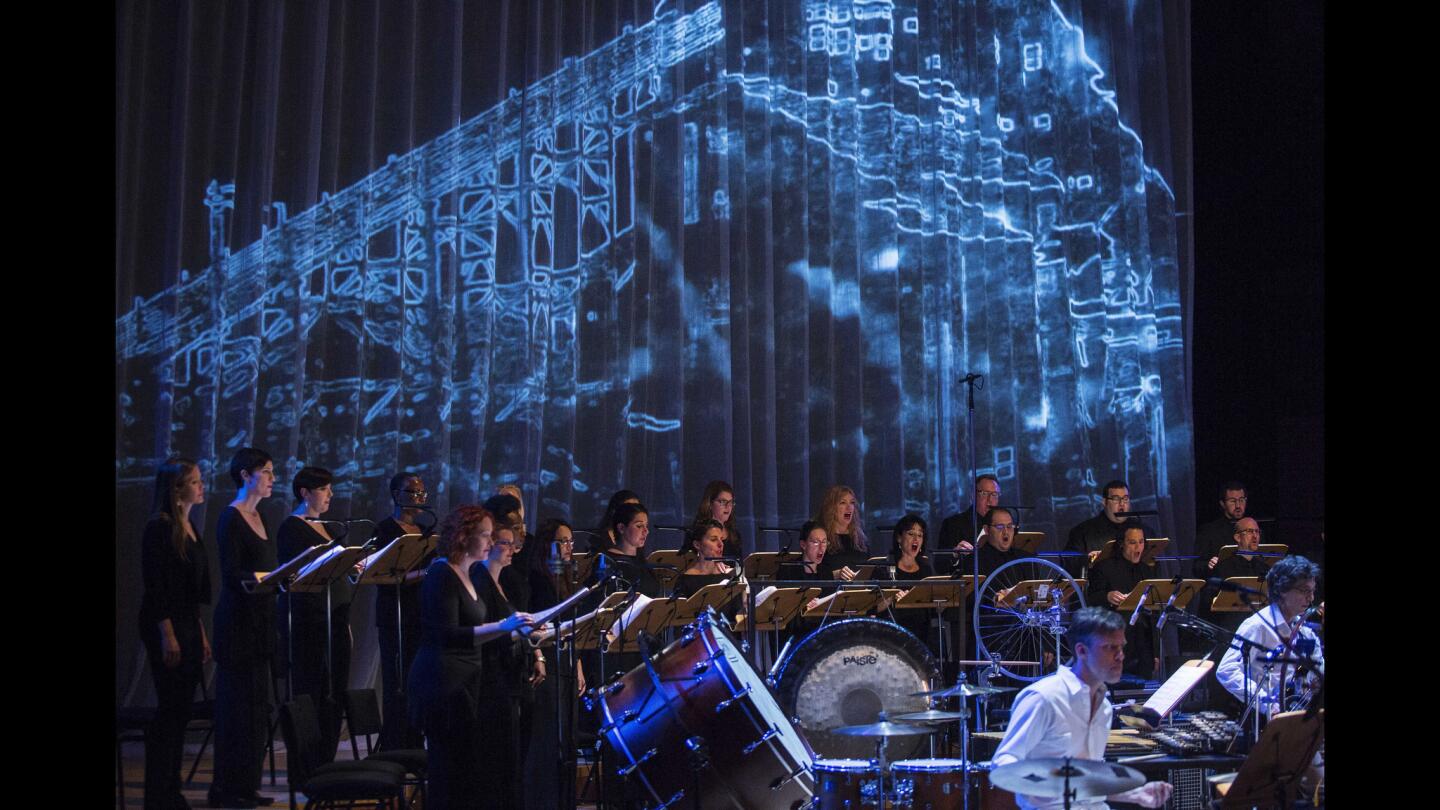 The Los Angeles Master Chorale conducted by artistic director Grant Gershon performs Julia Wolfe's "Anthracite Fields: Music of the Coal Miner" at Walt Disney Concert Hall on Sunday night March 6, 2016, in Los Angeles.