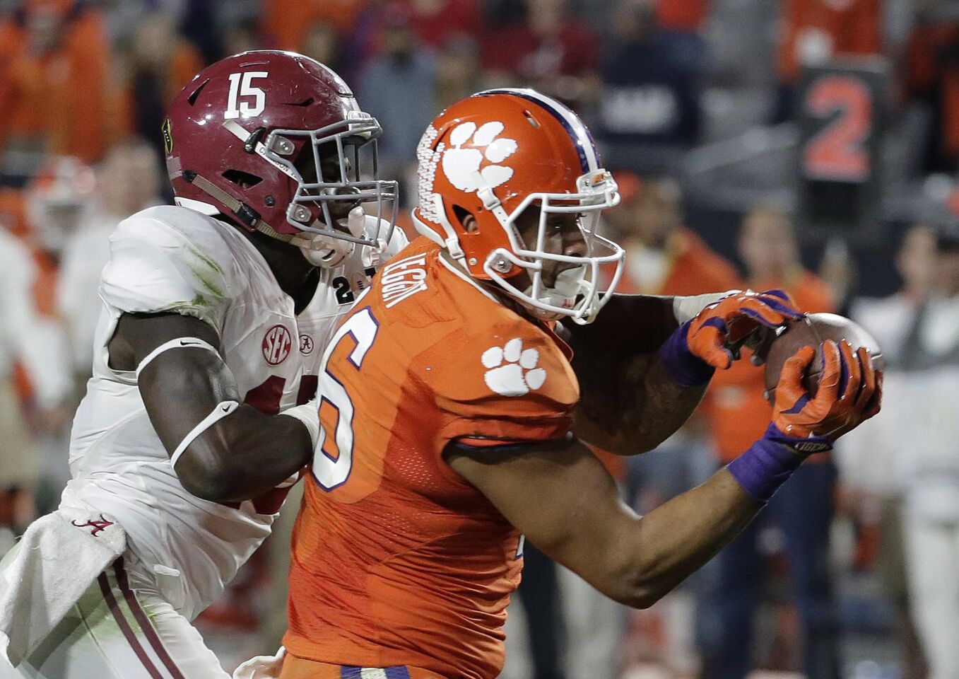 Clemson's Jordan Leggett (16) catches a touchdown pass in front of Alabama's Ronnie Harrison during the second half.