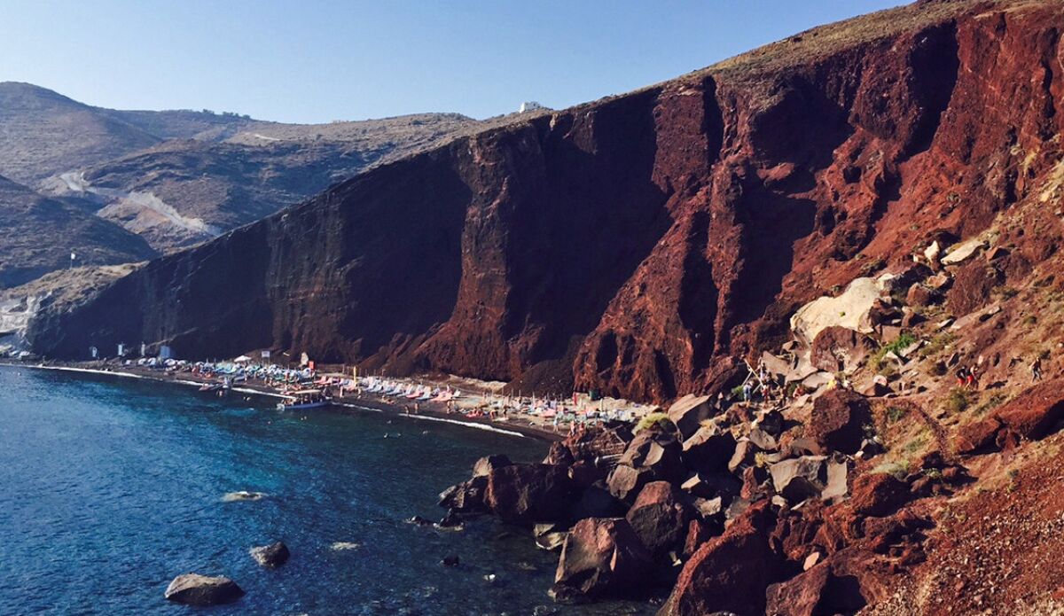 The Red Beach on Santorini is one of the island's most beautiful. It is accessible via a walk over the rocky red volcanic rocks that give it its signature color.