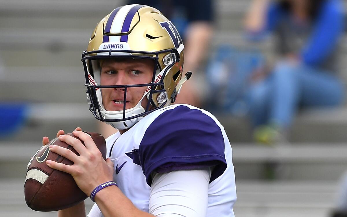 Washington quarterback Colson Yankoff warms up before a game against UCLA in October 2018.