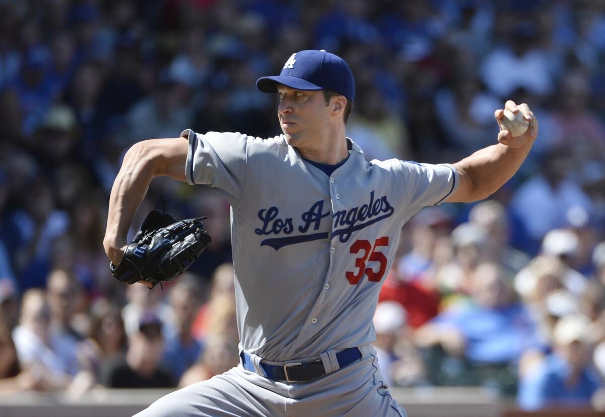 Dodgers starter Chris Capuano delivers a pitch during Saturday's 3-0 victory over the Chicago Cubs.