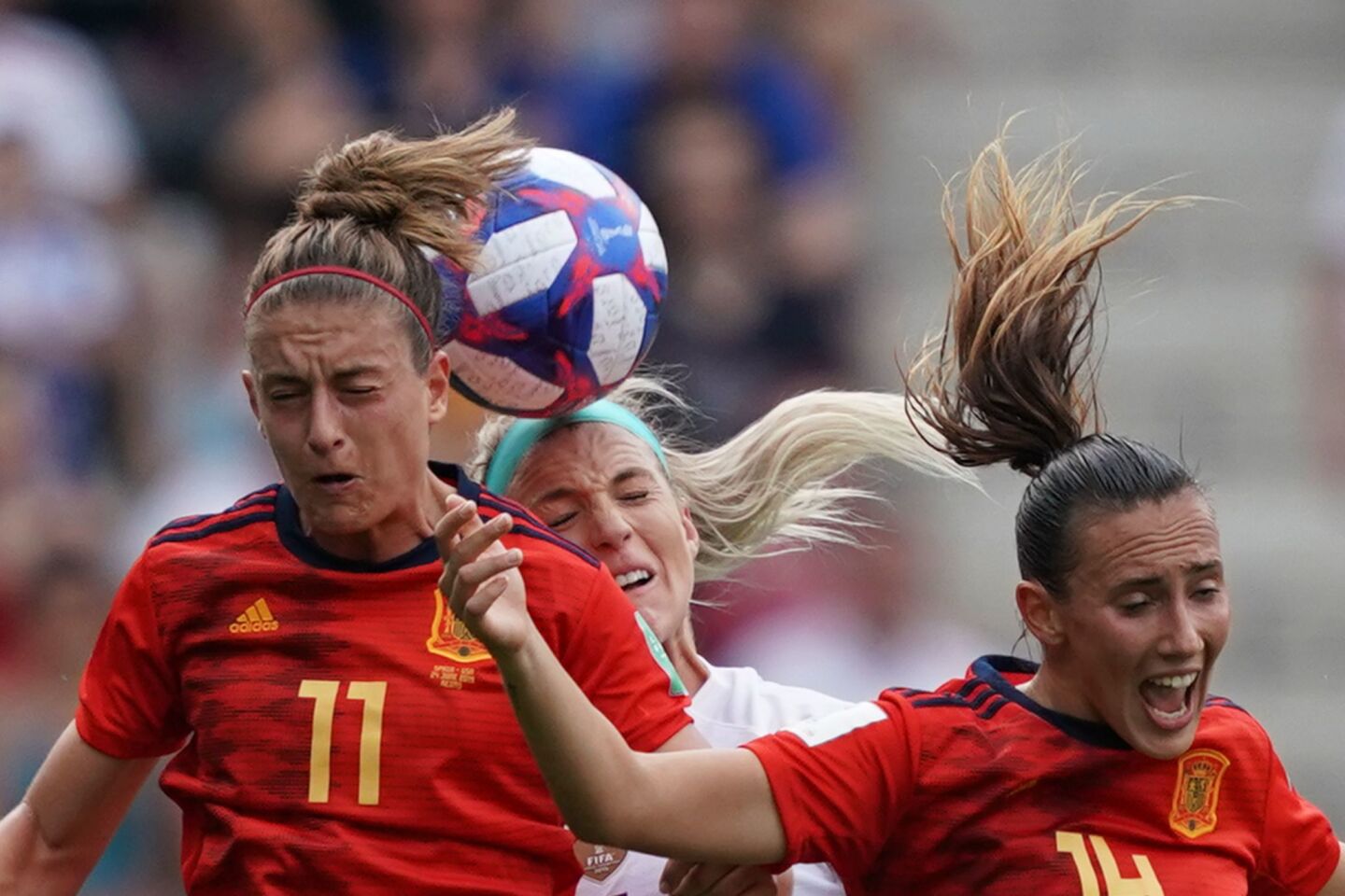 U.S. midfielder Julie Ertz vies with Spain's Alexia Putellas, left, and Virgina Torrecilla on Monday at the Women's World Cup in Reims, France.