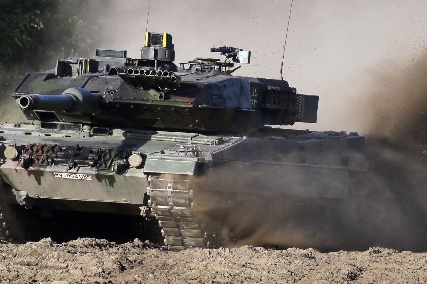 FILE --A Leopard 2 tank is pictured during a demonstration event held for the media by the German Bundeswehr in Munster near Hannover, Germany, Wednesday, Sept. 28, 2011. Poland will apply to the German government for permission to supply the German-made Leopard battle tanks to Ukraine. (AP Photo/Michael Sohn, File)