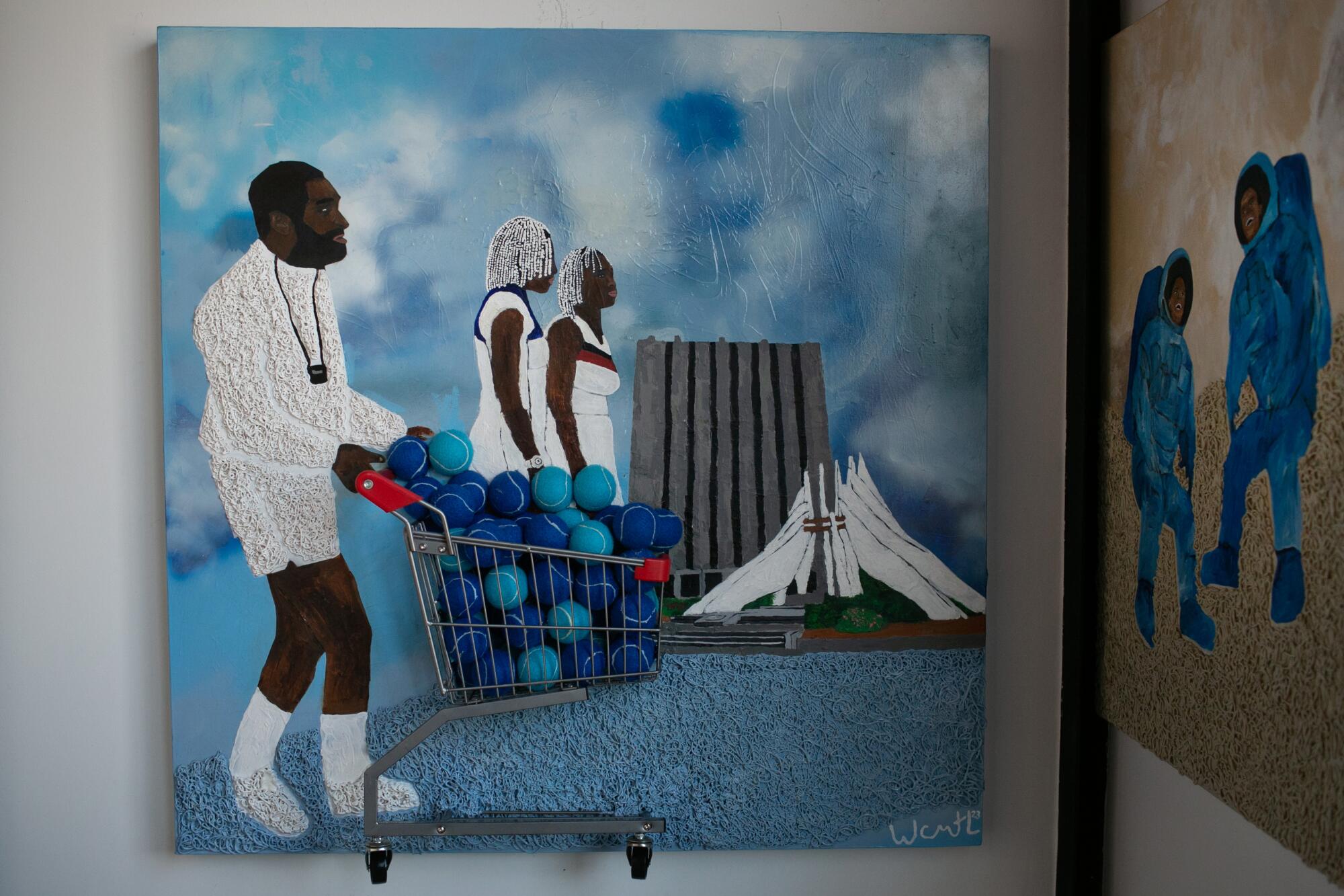  A multimedia art piece depicts tennis coach Richard Williams and his tennis star daughters Venus and Serena