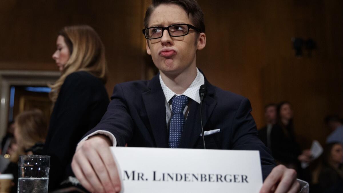 Ethan Lindenberger prepares to testify at a Senate committee hearing March 5, to examine vaccines, focusing on preventable disease outbreaks. He said his mother, an anti-vaccine evangelist, relies on Facebook or Facebook-linked sites for all of her information on the subject.