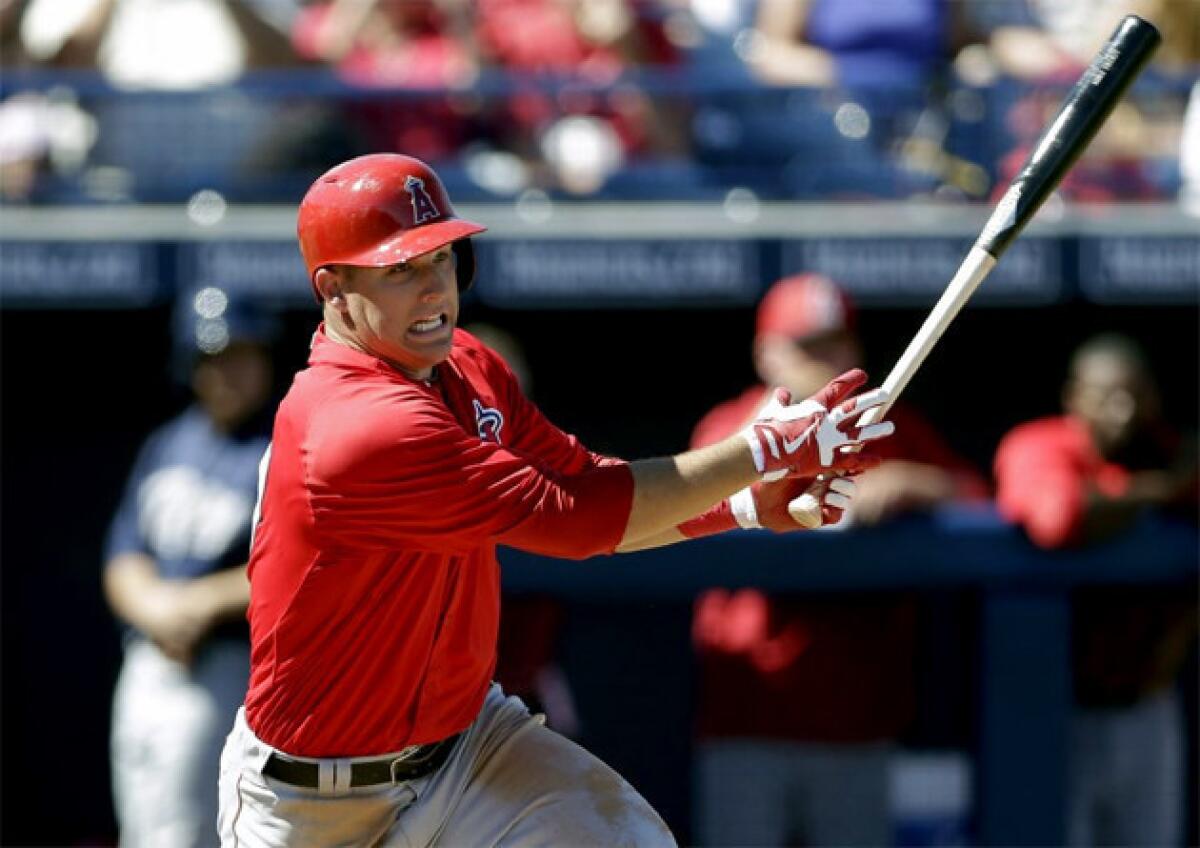 Mike Trout singled and scored on a passed ball in the first inning and walked in the third against the Brewers.
