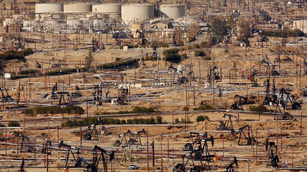 A sea of pumpjacks, used to lift liquid oil out of wells, can be seen in Oildale in north Bakersfield in 2016. (Al Seib / Los Angeles Times)
