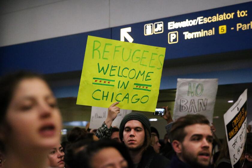 People protest President Donald Trump's immigration and refugee order at O'Hare International Airport on Jan. 28, 2017, in Chicago.