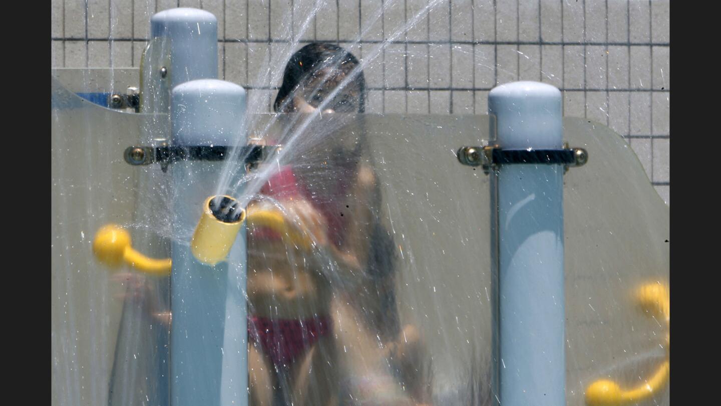 Photo Gallery: Heat wave brings people from near and far to the Verdugo Aquatic Center