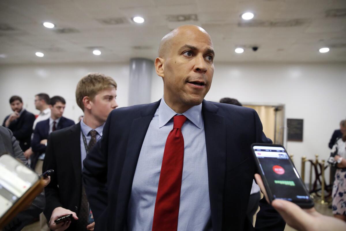 Sen. Cory Booker (D-N.J.) speaks to reporters on Capitol Hill.