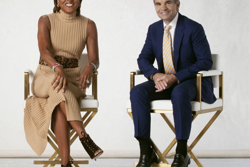 This image released by ABC shows "Good Morning America" co-hosts Robin Roberts, left, and George Stephanopoulos, who the longest-serving pair of hosts on one of the ABC, CBS or NBC morning news shows. (Heidi Gutman/ABC via AP)