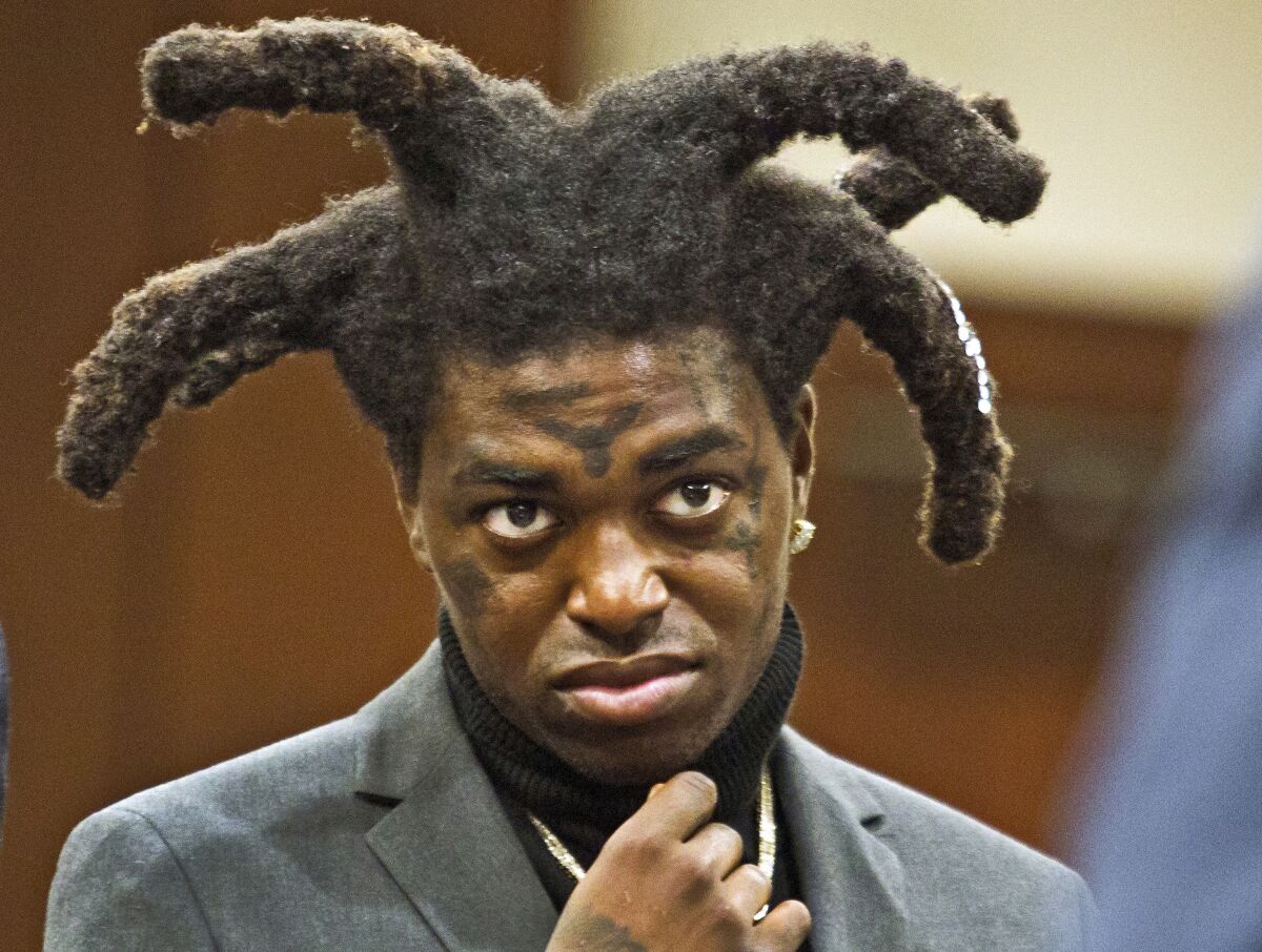 FILE - Rapper Kodak Black appears in court at the Florence County, South Carolina, courthouse in Florence, S.C., April 28, 2021. Los Angeles Police say four people were shot and wounded after a fight broke out outside a Los Angeles restaurant hosting a party that followed a Justin Bieber concert early morning Saturday, Feb. 12, 2022. Black is among several people involved in the brawl when shots rang out, sending everyone at the scene running for cover. Law enforcement sources told NBC News that Black, whose legal name is Bill Kapri, was among the people shot and injured. (Matthew Christian/The Morning News via AP, File)