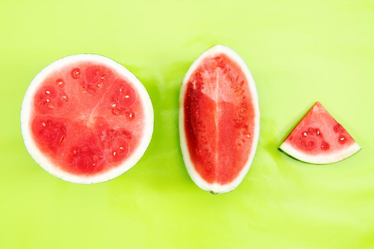 A half, quarter and wedge of a watermelon in studio on Thursday, Aug. 27, 2020 in Los Angeles, CA. 