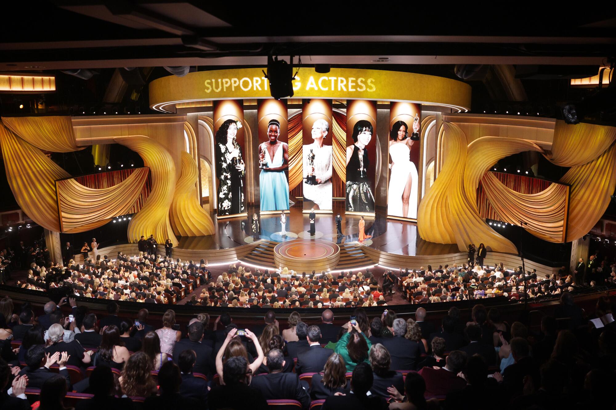 Mary Steenburgen, from left, Lupita Nyong'o, Jamie Lee Curtis, Rita Moreno and Regina King present at the 2024 Oscars.