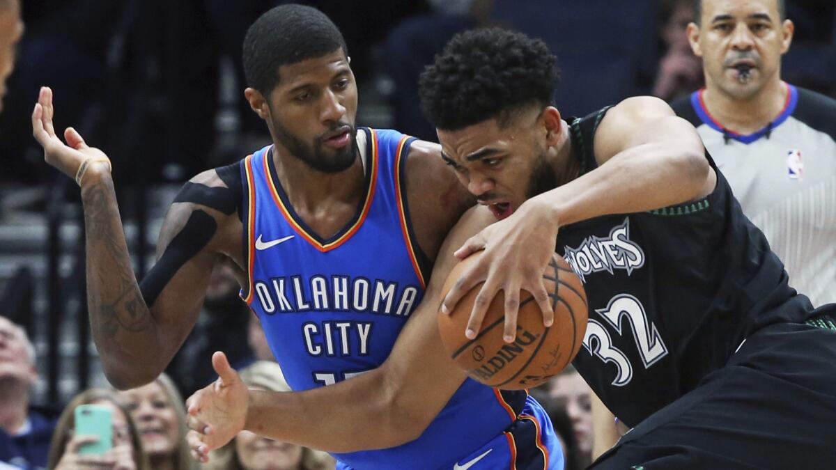 Paul George's defense, on display here against Timberwolves center Karl-Anthony Towns, is just as potent as his offense.