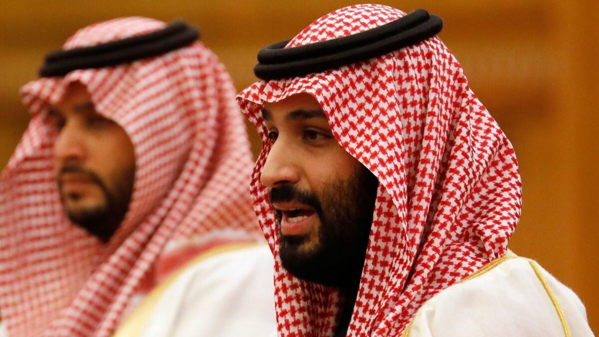 Saudi Crown Prince Mohammed bin Salman, right, at the Great Hall of the People in Beijing in February.
