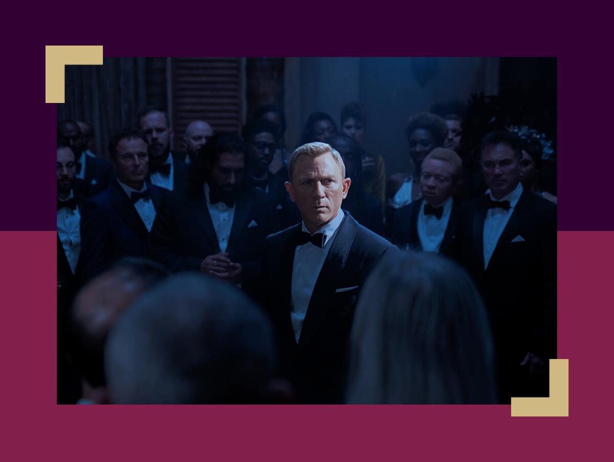 Daniel Craig as James Bond stands in a crowd in a scene from in 'No Time To Die.'